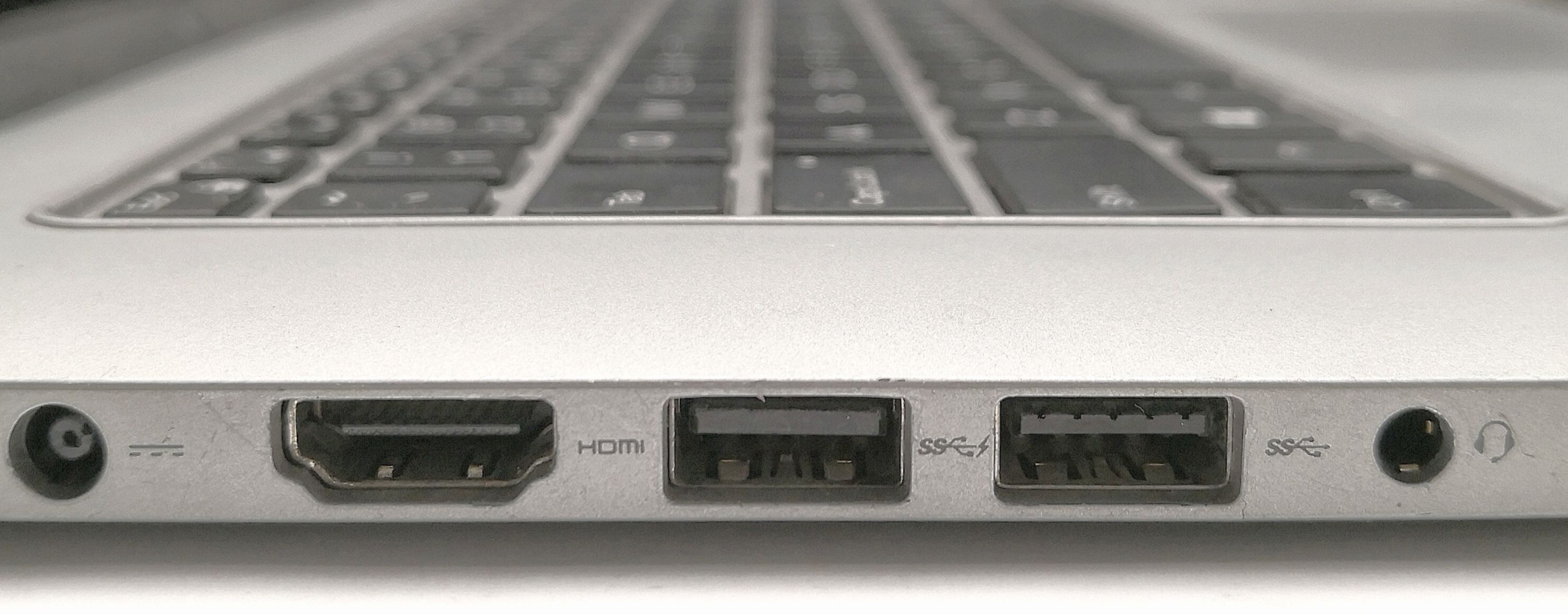 Typical set of ports in a modern laptop: power, HDMI, 2x USB and a 3.5mm jack.